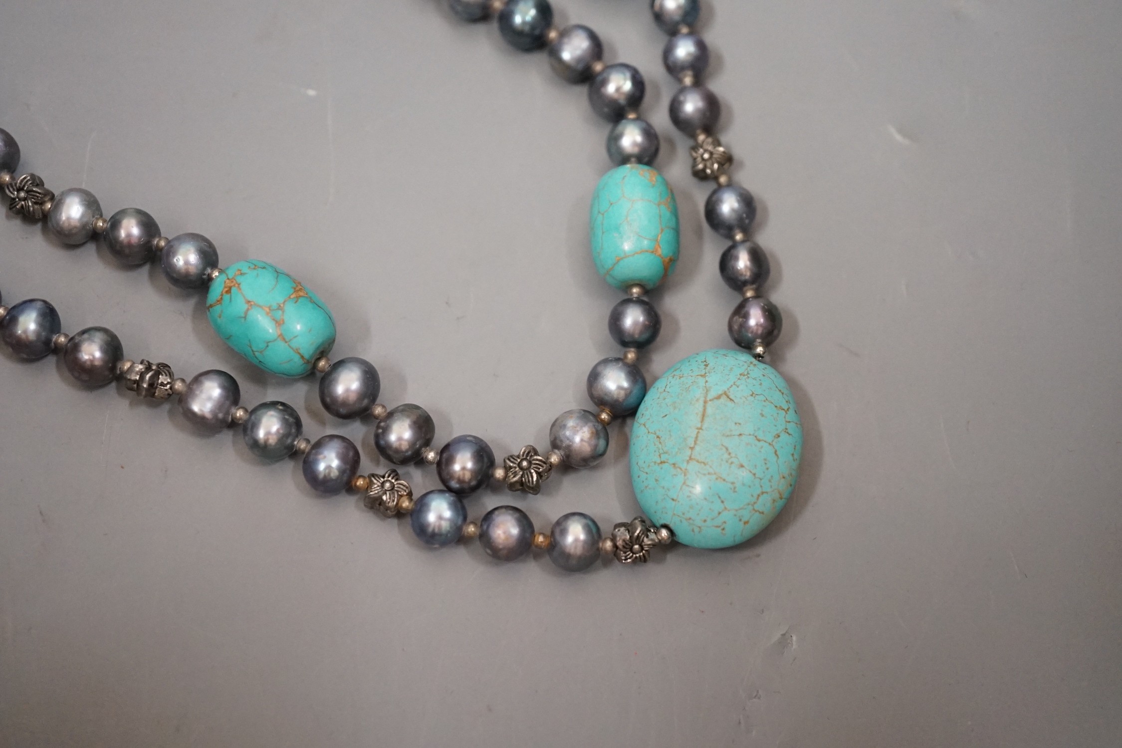A single/double strand Tahitian? cultured pearl and turquoise necklace, 54cm.